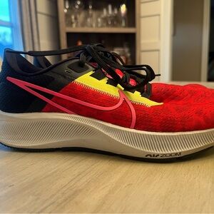 Nike Men's Red Black Running Shoes with Pink Swoosh and Yellow Accent